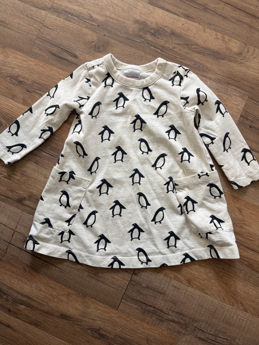 Hanna Andersson Cream Baby Dress with Black Penguin Print